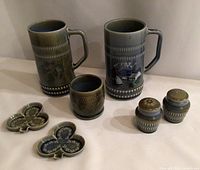 Group shot of all seven Wade stoneware pieces