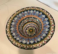 Top view of multicolor Deruta footed pedestal bowl showing pattern and condition