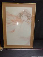 Full view of framed artwork showing subject and frame