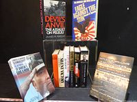 Front view showing Devil's Anvil, Eagle Against the Sun, It Doesn't Take a Hero, Hitler's Willing Executioners and central group of books