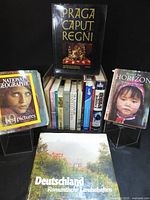 Group shot showing full assortment of world travel photography books