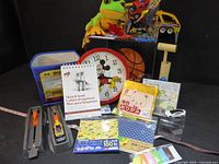 Group shot showing all toys, clock, basketball, craft packs and accessories