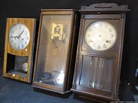 Front view of all three wall clocks