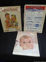 Front view showing three magazines: Capper's Farmer, The Illustrated London News, Journal