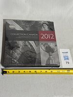 Front view of sealed Collection Canada 2012 book showing title and price