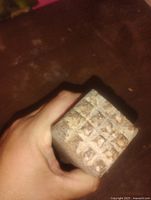 Textured striking face with raised pyramids