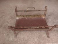 overall view of cast iron log holder grate