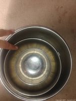 Four stainless steel bowls nested together