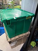 Both totes stacked, showing colors, lids and wear