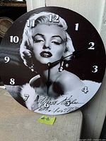 Front view of Marilyn Monroe round wall clock