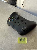 Top view of black Xbox wireless controller showing buttons and joysticks