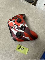 Front view showing red camo PowerA Xbox controller with buttons and sticks