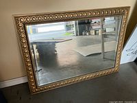 Front view of mirror showing entire frame and glass