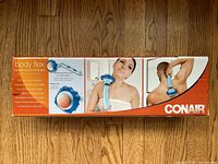 Box showing Conair Body Flex Heated Wand Massager graphics and branding