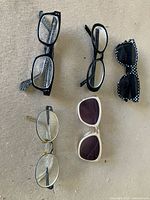 Five pairs of eyewear spread out for full view