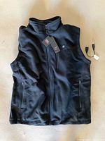front view of new black insulated vest with attached tag and included usb cable