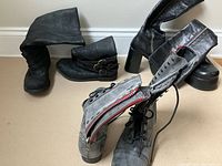 All three pairs of boots displayed together