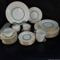 Full view of set showing plates, cups, saucers