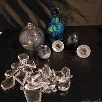 Group shot showing all glass items on black surface