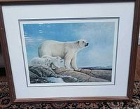 Front view of framed polar bear print with mat and frame