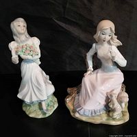 Front view of both Tengra figurines