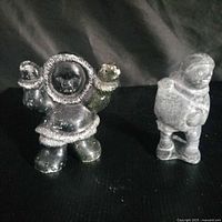Front view of both Inuit stone figures