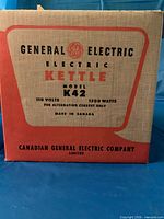 Front of original General Electric K42 kettle box showing branding and specifications