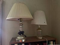 Both table lamps showing design, materials and shades