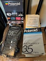Processor in sealed plastic next to box and paperwork