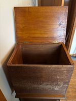 Chest exterior with lid open showing overall construction and finish