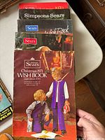 Stack of five Sears and Simpsons-Sears Wish Book catalogs, top issue dated Christmas 1971 visible