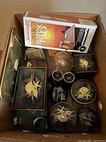 Box containing all lacquerware pieces, glass bowl and boxed heating pad