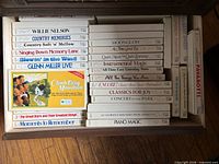 Drawer containing approximately 25 cassette tapes in slipcases showing various Time Life and Living Era compilation titles