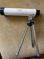 Telescope mounted on chrome tripod