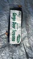 Sealed Bug Barrier Cargo Door Screens package on tarp