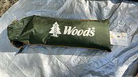 Green Woods carrying bag holding tent