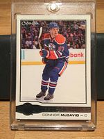 Front of Connor McDavid rookie card in holder