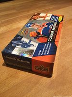 Closed retail box showing Upper Deck logos and Connor McDavid imagery