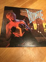 Front jacket featuring Bowie image and album title