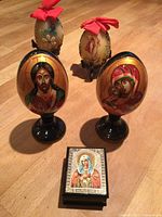 Front view of two wooden icon eggs, two wax-beaded eggs and trinket box
