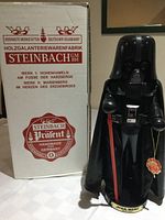 Nutcracker standing next to original Steinbach box