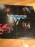 Front cover showing Van Halen logo and band member photos