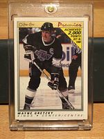 Front of Wayne Gretzky 2,000 Points card in holder