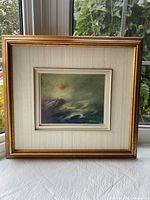Front view of framed oil seascape showing frame, matting and artwork
