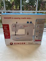Front of boxed Singer Start 1304 sewing machine
