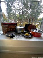 All bundled items arranged together on a windowsill