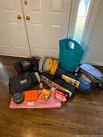 All items grouped: sleeping bags, tents, mattress, coolers, cookware, accessories