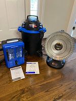 All three devices with manuals displayed