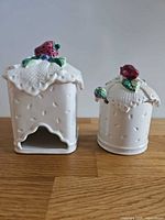 Tea caddy and sugar bowl side by side showing size and shape