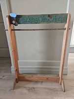 Full view of wooden freestanding stocking holder